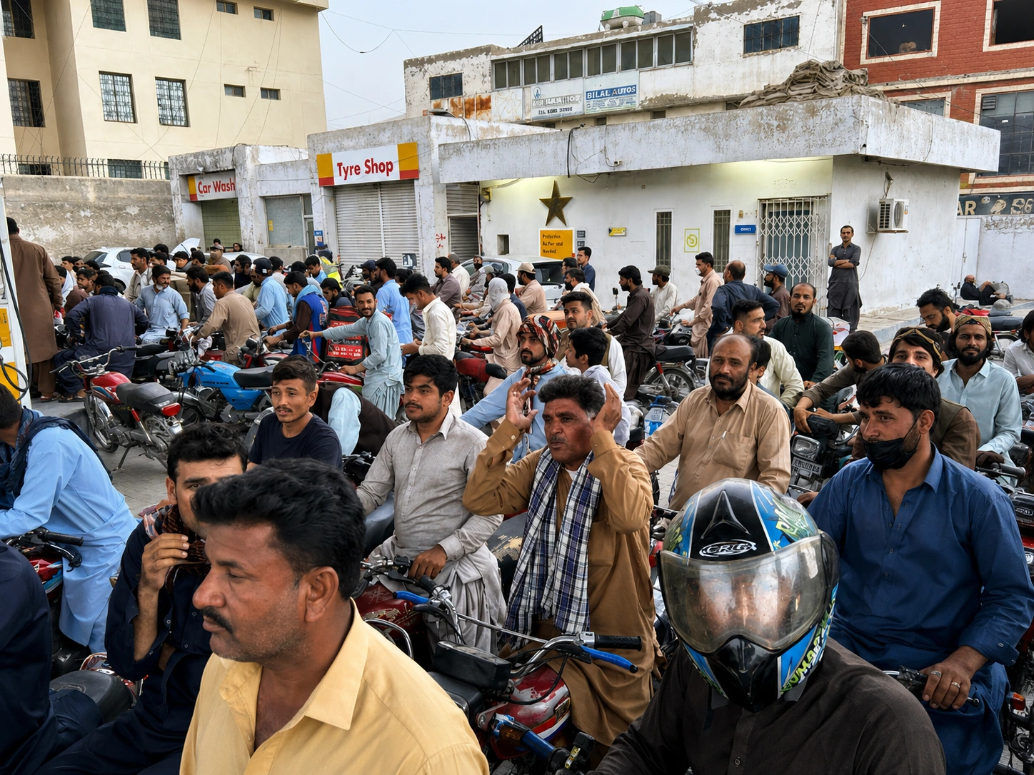 Balochistan petrol crisis Rs500 per litre — long queues at Quetta fuel station with price board showing emergency pricing after Iranian fuel supply suspension