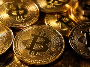 Bitcoin loss MSTR stock price chart showing 77% decline from all-time high with $20 billion market value erasure and Bitcoin holdings underwater